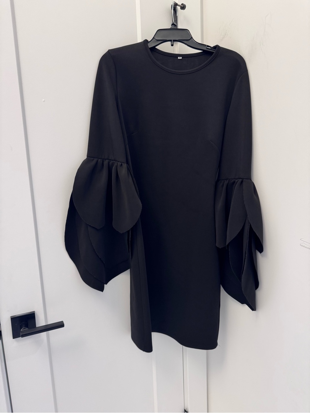 Elegant Black Dress with Statement Ruffle Sleeves